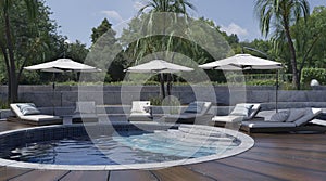 Swimming pool with sun loungers and umbrellas 3d illustration