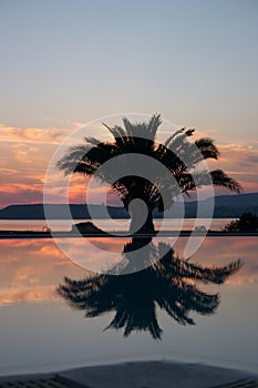 Swimming pool sunset