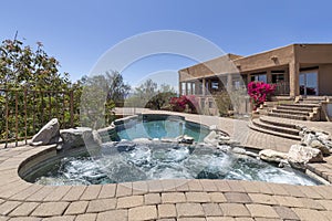Swimming pool with terraced patio