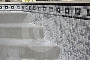 Swimming pool tiling