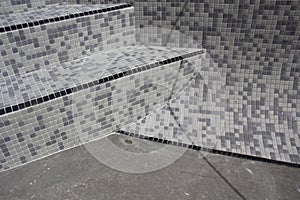 Swimming pool tiling