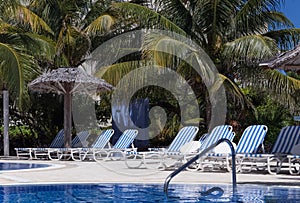 Swimming pool view with sun lounger in Cuba