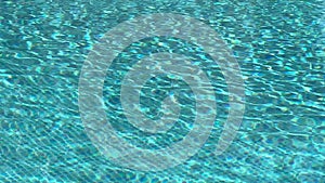 Swimming pool water as summer holiday background, crystal blue texture, summertime and travel inspiration, slow motion