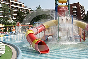 Swimming pool with water slide