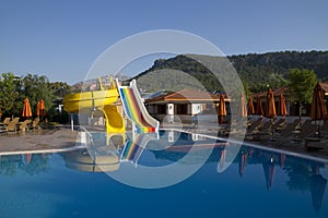 Swimming pool with water slide