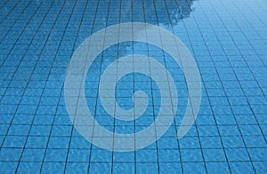 Swimming Pool water textured surface background summer reflection rippled wave pattern sunlight