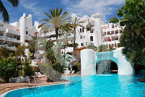 Swimming pool with waterfall