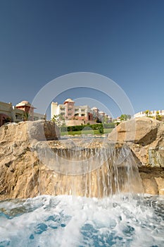 Swimming pool waterfall