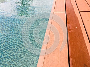 swimming pool with wooden path