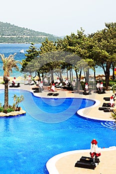 Swimming pools and beach at luxury hotel