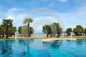 Swimming pools at the beach of luxury hotel