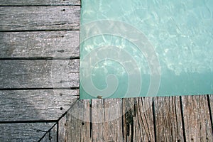 swimming Pools edge wooden decking background