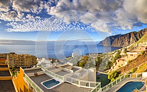 Swimming pools on hotel roof, Panorama in Los Gigantos, Tenerife, Canarian Islands