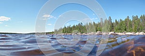 Swimming in the river Skelleftealven in Vasterbotten, Sweden