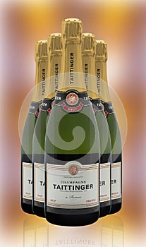 Five Bottles of Taittinger Brut Champagne on an abstract  background