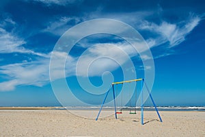 Swing, beach, sea; Rocket float tower