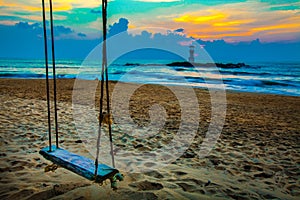 Swing on the beach,sunset and beach. Beautiful sunset above the