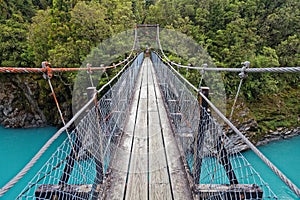 Swing bridge over the Hokitika river, west coast, New Zealand