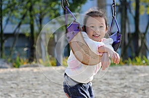 Swing little girl