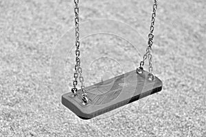 Swing on a playground photo