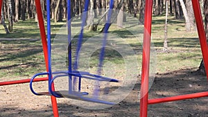 Swing in the playground. Recreation. Desolation. Emptiness