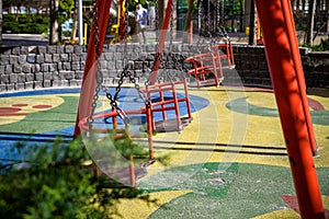 Swing on playground, Set of chain swings on modern kids playground