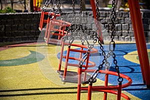 Swing on playground, Set of chain swings on modern kids playground