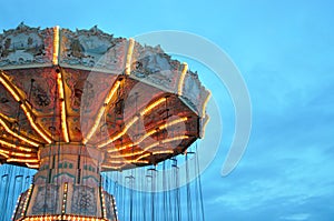 Swing Ride at the Fair in the Evening