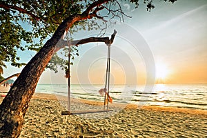 Swing on sunset at the beach