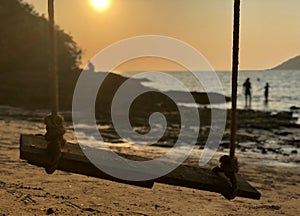 Swing during sunset at prao beach