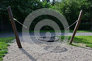 swing trains stability at the children\'s rope center, playground for schoolchildren.