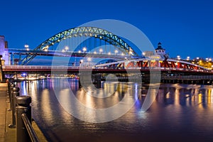 Swing and Tyne Bridges at night