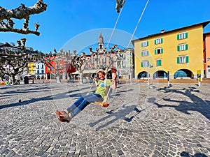 Swing the World ride on Piazza Giuseppe Motta, Ascona, Switzerland photo
