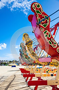 Swingboats on the beach photo