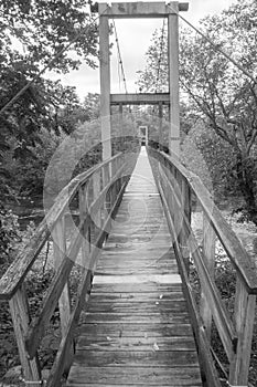 A Swinging Footbridge over a Craig Creek
