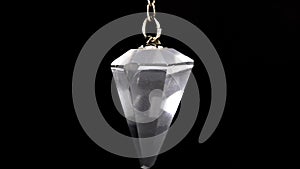 Swinging pendula, crystal mineral