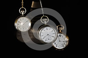 Swinging Pocket Watches Beckoning You to Look More Closely