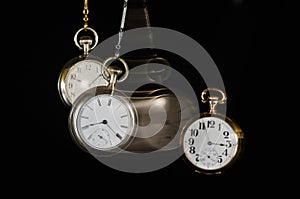 Swinging Pocket Watches Beckoning You to Look More Closely