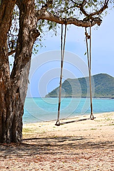 Swinging with tropical beach in thailand