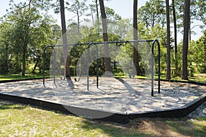 Swings for baby and small children at a scenic playgorund in Destin Florida