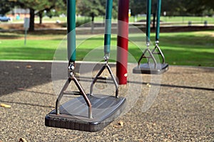 Swings in children`s playground
