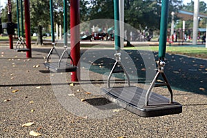 Swings in children`s playground