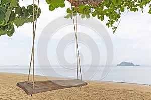 Swings on an island with sea view