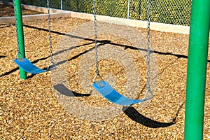 swings in a park playground no kids