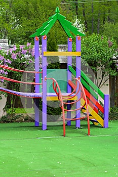 Swings and slides in the park for children. Children& x27;s playgroun