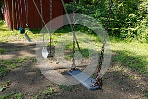 Swingset at summer camp with a broken swing