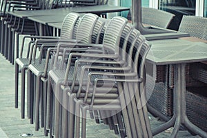 Swinoujscie, West Pomeranian - Poland - June 16, 2021: Plastic chairs and tables on fresh air in outdoor restaurant or cafe in