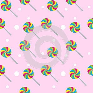 Swirl lollipop seamless pattern on pink color background. Colorful vector illustration for halloween , christmas or new year