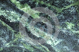 A swirled, green marble texture for graphic design purposes