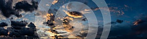 Swirling clouds sunset, panorama